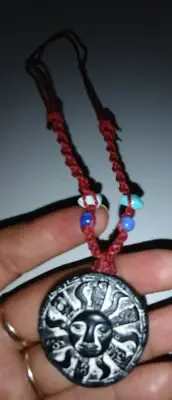 Peruvian necklace woven in macrame thread with natural stone Inca Sun God
