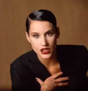 Canadian supermodel Eve Salvail wearing a black pinstripe suit dur- Old Photo 2