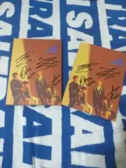 2 autographed albums by the group SIGNAL