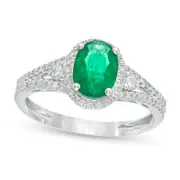 Oval Emerald and 0.25 CT. T.W. Natural Diamond Frame Split Shank Ring in Solid 14K White Gold