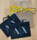 Set of 4 luxury paper shopping bags: A/X, L'Occitane, Lucky Brand