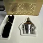 Estee Lauder solid perfume 2000 Champagne Bottle NIB