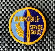OLDSMOBILE SERVICE GUILD EMBROIDERED SEW ON PATCH GENERAL MOTORS AUTO 2 1/2" NOS