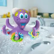 Nuby Purple Octopus Hoopla Floating Interactive Bath Toy - 3 Tossing Rings Fun