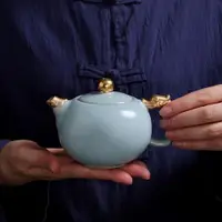 在飛比找ETMall東森購物網優惠-天青色鎏金家用辦公汝瓷可養茶壺