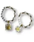 Elastic bracelet with Feng Shui prosperity pendants. Buddhist Wealth.