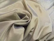 Bronze lightweight woven silk-like drapery material of smoke and gold threads