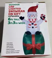 Outdoor LED Lighted Inflatable Snowman on Gift - 6 ft Tall - 3ft 3in Wide - NIB