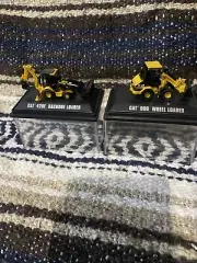 Two Mini Caterpillar Toys