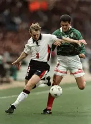 Stuart Pearce of England Benjamin Galindo of Mexico battle for the- Old Photo