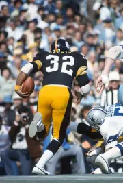 Running Back Franco Harris Pittsburgh Steelers carries the ball v- 1976 Photo