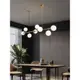 餐廳吊燈現代簡約飯桌北歐輕奢極簡藝術高端led長條一字魔豆燈具