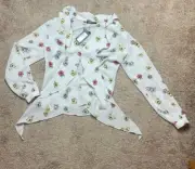 Nasty gal white long sleeve blouse with floral print. Size 4. Front tie sexy
