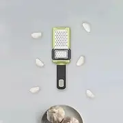Premium Stainless Steel Garlic Grater and Crusher - Easy-to-Use Kitchen Tool for Effortless Garlic and Ginger Grating - Durable, Rust-Resistant, and Dishwasher Safe.