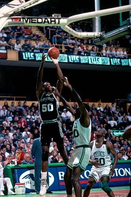David Robinson San Antonio Spurs shoots over Robert Parish Boston - Old Photo