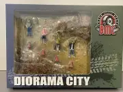 BMC 1:64 DIORAMA CITY RALLY STAGE WITH FIGURES DIRT VERSION