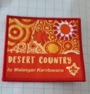 Aboriginal design Desert Country by Walangari Karnataka Scouts Australia Badge