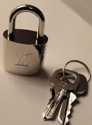 Brand New Louis Vuitton Silver Padlock and 2 keys