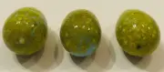 Rare set of three opaque egg shaped marbles