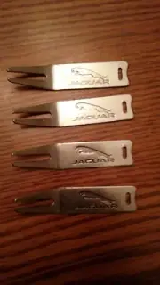 Set of 4 metal Jaguar logo golf divot tools. Free ship