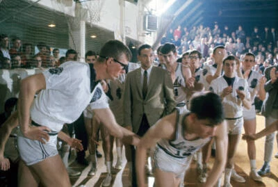 Kenyon John Dunlop entering game vs Otterbein Lords teammate Larry- Old Photo