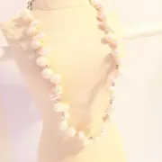 Freshwater White Baroque Strand of Off-Set Pearls with Pink Crystal Spacers with