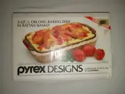 NEW Pyrex Designs 2 Quart Oblong Baking Dish in Rattan Basket Model 2320-F-R