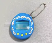 Bandai Tamagotchi Osutchi blue Virtual Pet Japan