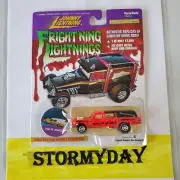 Johnny Lightning FRIGHTNING LIGHTNINGS HAULIN HEARST fluorescent red in color