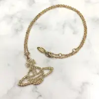 在飛比找momo購物網優惠-【Vivienne Westwood】璀璨金色土星項鍊(平輸
