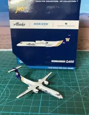 1:400 Gemini Jets Alaska Airlines Dash-8 Q400 REG: N435QX Washington Huskies NEW
