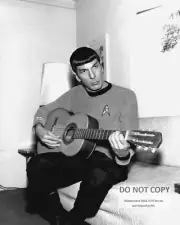 11X14 PUBLICITY PHOTO - LEONARD NIMOY AS "MR. SPOCK" PLAYING A GUITAR (ZZ-578)