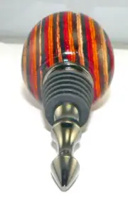 Handmade Black Titanium Plated Bottle Stopper with a Festival Laminated Handle