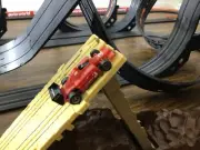 AFX BRAND NEW FOREIGN SET CAR POINTED ROLL