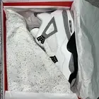 Air Jordan 4 White Cement