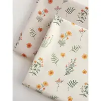 在飛比找ETMall東森購物網優惠-韓國進口橘黃野花服裝棉麻布料