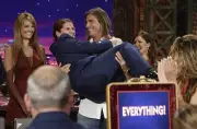 Actor Fabio holding an Armed Service audience member and the ladie- Old Photo