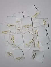 "MADE IN USA" Fabric Garment Tags. Embroided w/ Gold Letters- 3/4"x5/8"- 2,000
