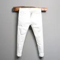 在飛比找ETMall東森購物網優惠-破洞夏季薄款白色九分男士牛仔褲