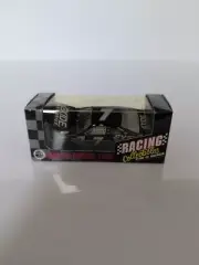 Action NASCAR Geoff Bodine #7 Exide Black 1/10,080 1:64 Scale Diecast