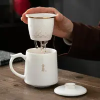 在飛比找ETMall東森購物網優惠-日本FS羊脂玉白瓷茶杯辦公杯茶水分離陶瓷水杯大容量帶蓋杯子馬