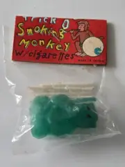 Vintage Trick Smoking Monkey with Cigarettes Toy Green