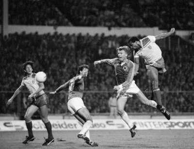 Cyrille Regis Of England Rises Above Bernd Forster Of West Germany 1982 Photo