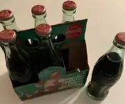 6 Commemorative Coca Cola Bottles “A Christmas Present From A Christmas Past”