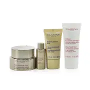 Clarins Nutri-Lumiere Collection: Day Cream 50ml+ Night Cream 15ml+ Treatment Essence 10ml+ Hand & Nail Treatment Cream 30ml+ Bag 4pcs+1bag