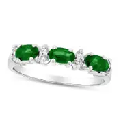 Sideways Oval Emerald and 0.10 CT. T.W. Natural Diamond Three Stone Ring in Solid 14K White Gold