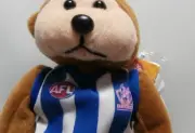 SKANSEN BEANIE KID NORTH MELBOURNE KANGAROOS AFL BEAR 03/2012 COLOUR FLAW
