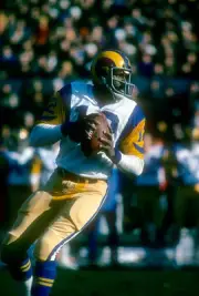 James Harris Los Angeles Rams drops back to pass v the Minnesota - 1974 Photo 5