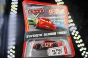 New in package- DISNEY PIXAR CARS NO STALL NO. 123 RUBBER TIRE KMART