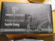 Gray Keeps Motorcycle Tamk bag Decent Sized Should Hold Whatever You Need.